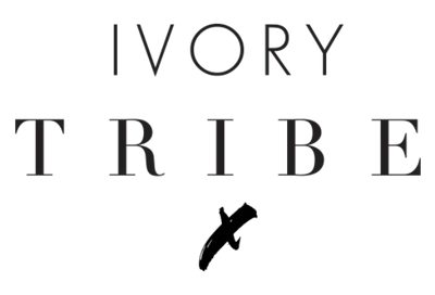 Black text 'IVORY TRIBE' with a black silhouette of an elephant on a white background